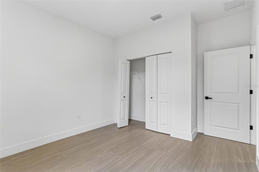 Spacious, unfurnished interior of a new home in , Port Charlotte (Image 37).