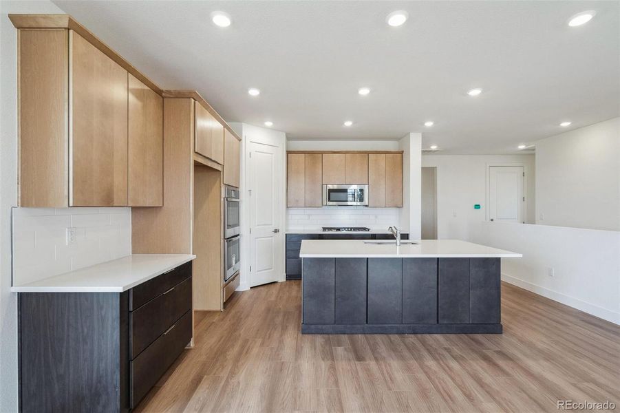 Furnished interior view inside a new home in Windsong, Thornton (Image 4).