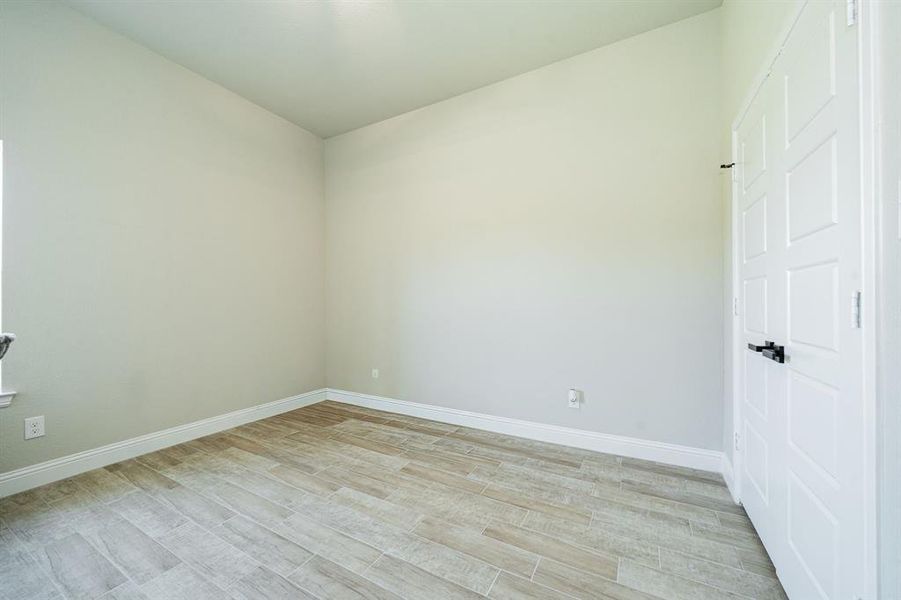 Empty room with light wood-style flooring Empty room with light wood-style flooring