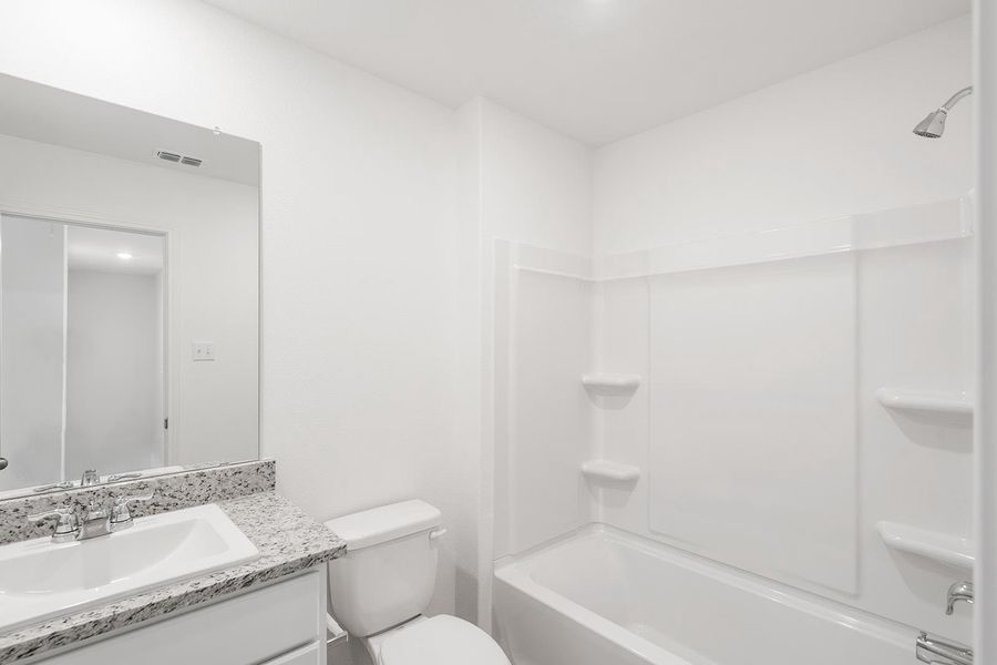 Furnished interior view inside a new home in Canyon Ranch, Jarrell (Image 4). Furnished interior view inside a new home in Canyon Ranch, Jarrell (Image 4).