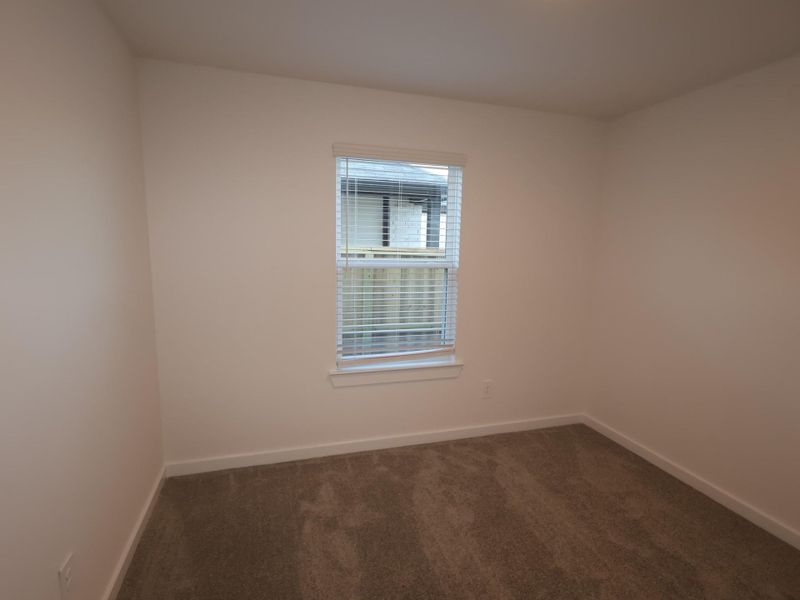 Spacious, unfurnished interior of a new home in Pinewood at Grand Texas, New Caney (Image 29).