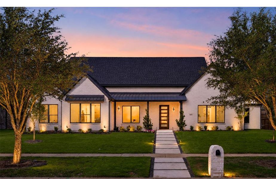 Front exterior of a new home in , Forney, TX, highlighting curb appeal (Image 25).