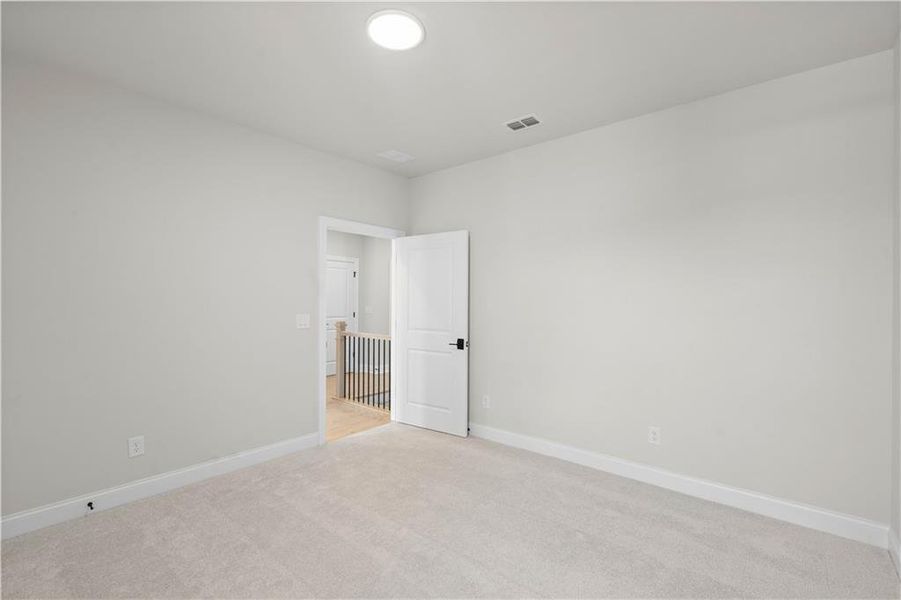 Spacious, unfurnished interior of a new home in Ward's Crossing Townhomes, Johns Creek (Image 35).