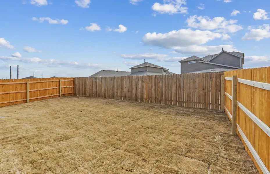 Exterior details and patio area of a home in Crosswinds, Kyle (Image 4).