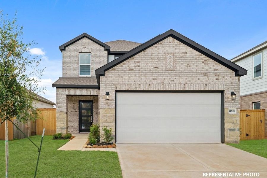 A house with a garage. A house with a garage.