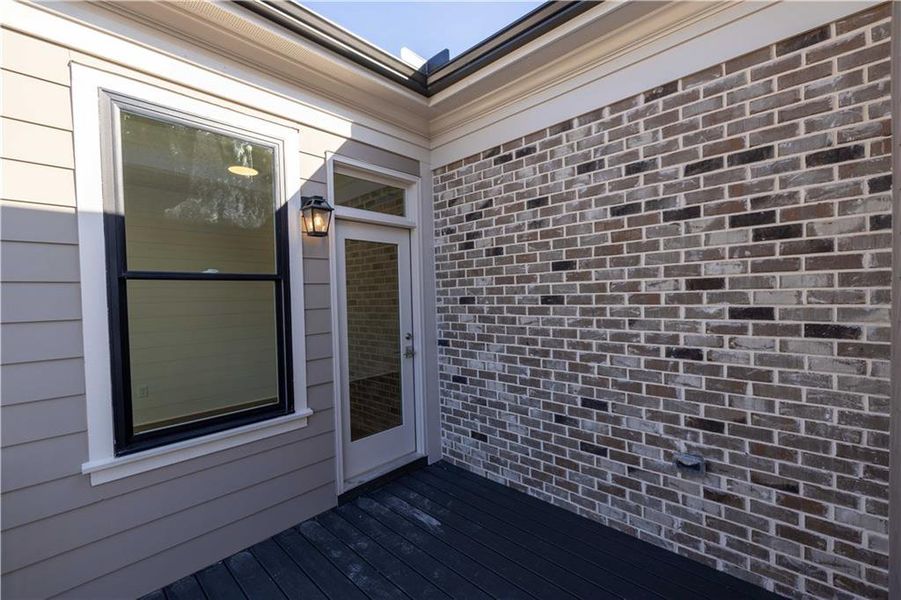 Exterior details and patio area of a home in Byers Park, Alpharetta (Image 3).