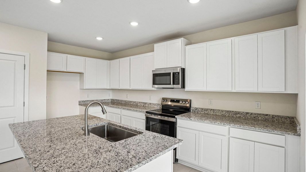 Furnished interior view inside a new home in Willowbrook North, Winter Haven (Image 14).