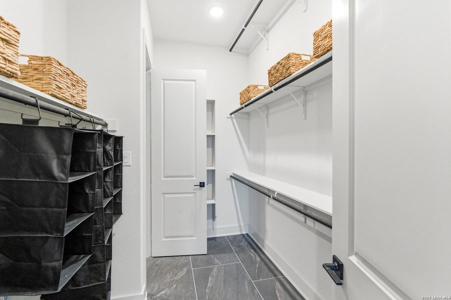 Furnished interior view inside a new home in Prominence, San Antonio (Image 40).