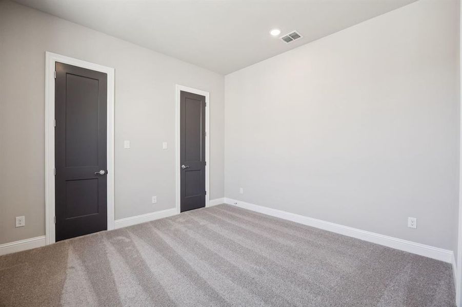 Bedroom with two closets for extra storage. Bedroom with two closets for extra storage.