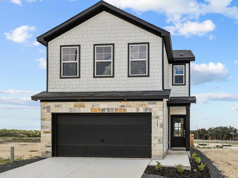 Front exterior of a new home in Meadows at Oak Creek, San Antonio, TX, highlighting curb appeal (Image 20).