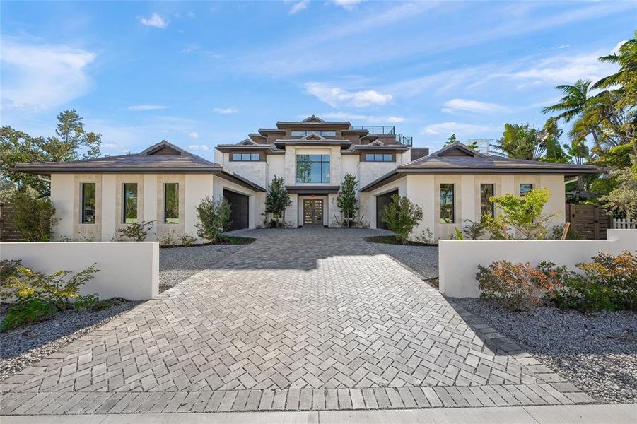 Front exterior of a new home in , Anna Maria, FL, highlighting curb appeal (Image 1). Front exterior of a new home in , Anna Maria, FL, highlighting curb appeal (Image 1).