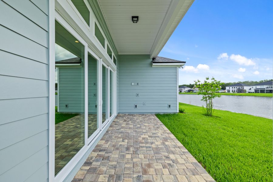 Representative exterior photo of a completed home built from the Aurora by Riverside Homes in Hidden Creek at SilverLeaf, St. Augustine, FL (Image 31).