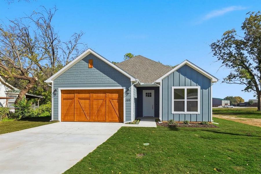 Front exterior of a new home in , Boyd, TX, highlighting curb appeal (Image 1).