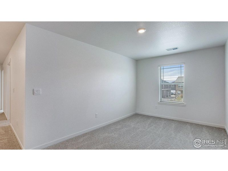 Spacious, unfurnished interior of a new home in Hansen Farm, Fort Collins (Image 35).