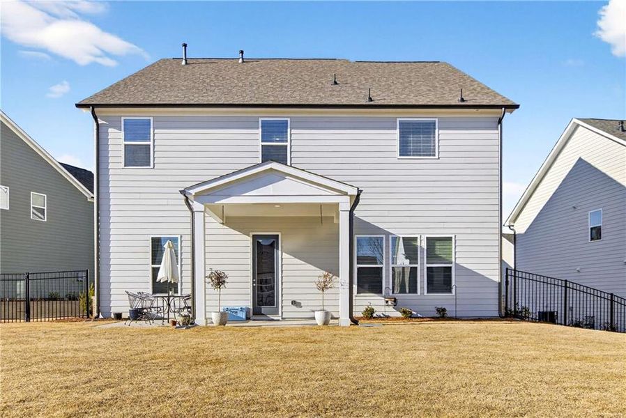 Exterior details and patio area of a home in East Harbor II at Chestatee, Dawsonville (Image 3).