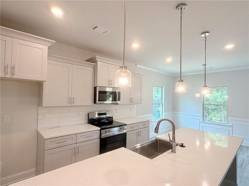Furnished interior view inside a new home in Magnolia Villas, Cornelia (Image 10).