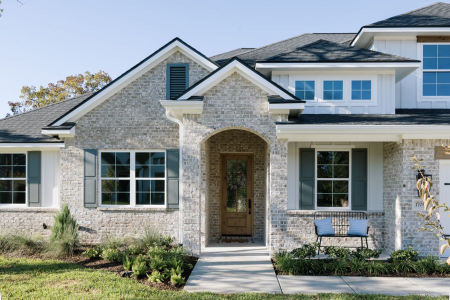 Representative exterior photo of a completed home built from the The Ellen II by Reece Homes in Greens Prairie Reserve, College Station, TX (Image 14). Representative exterior photo of a completed home built from the The Ellen II by Reece Homes in Greens Prairie Reserve, College Station, TX (Image 14).
