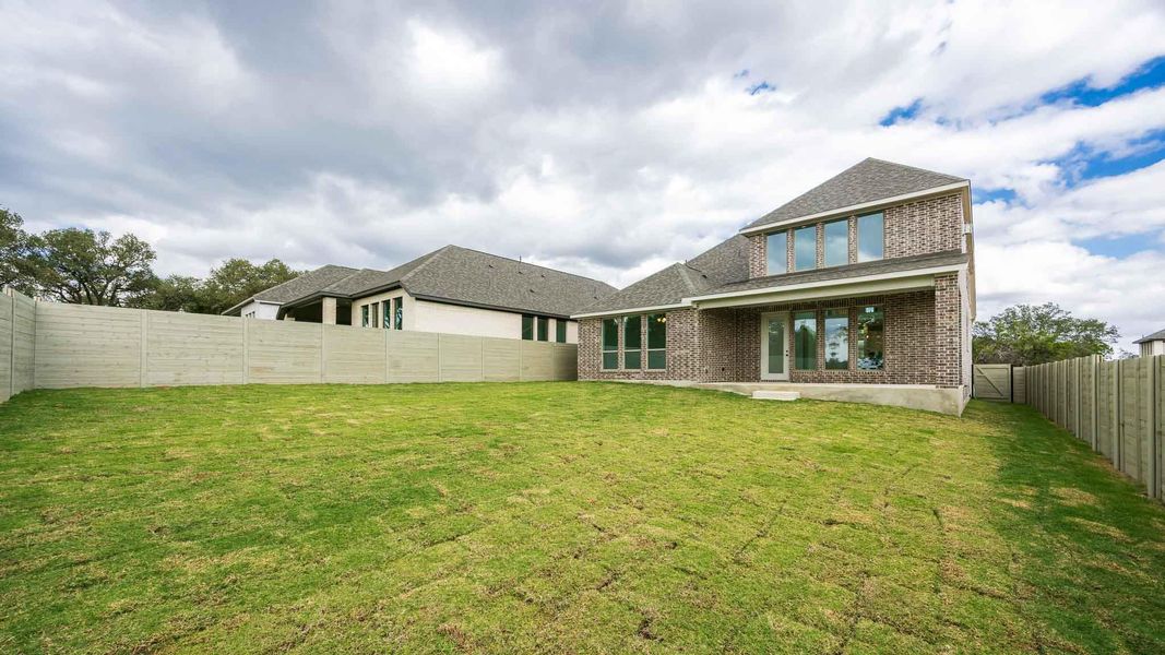 Exterior details and patio area of a home in Wolf Ranch 51', Georgetown (Image 3).