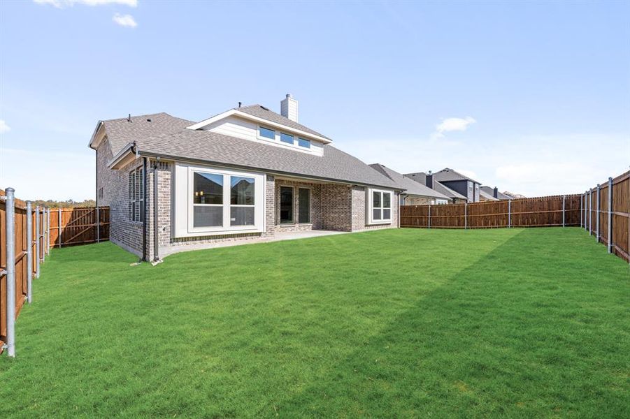 Exterior details and patio area of a home in Meadow Vista 60-65, Anna (Image 4). Exterior details and patio area of a home in Meadow Vista 60-65, Anna (Image 4).