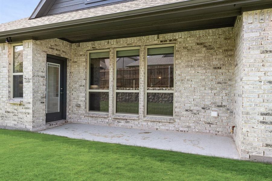 Front exterior of a new home in Legacy Ranch Classic 60, Melissa, TX, highlighting curb appeal (Image 2).