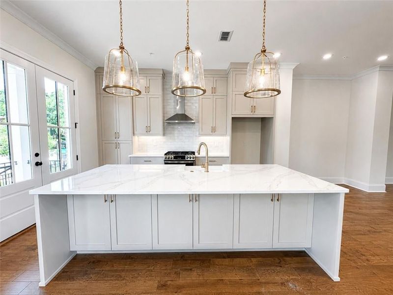 Gorgeous pendant lights add a special touch to the home's decor