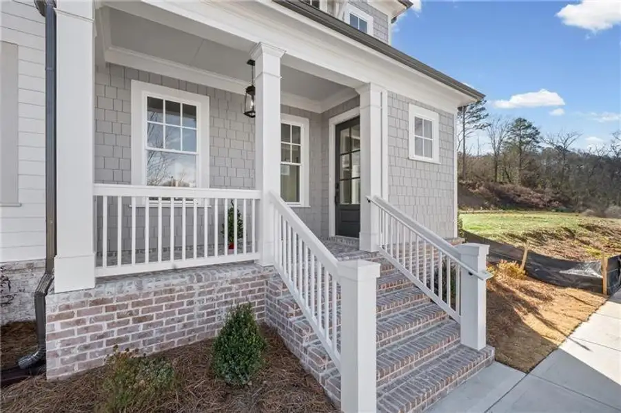 Exterior details and patio area of a home in , Ball Ground (Image 3).