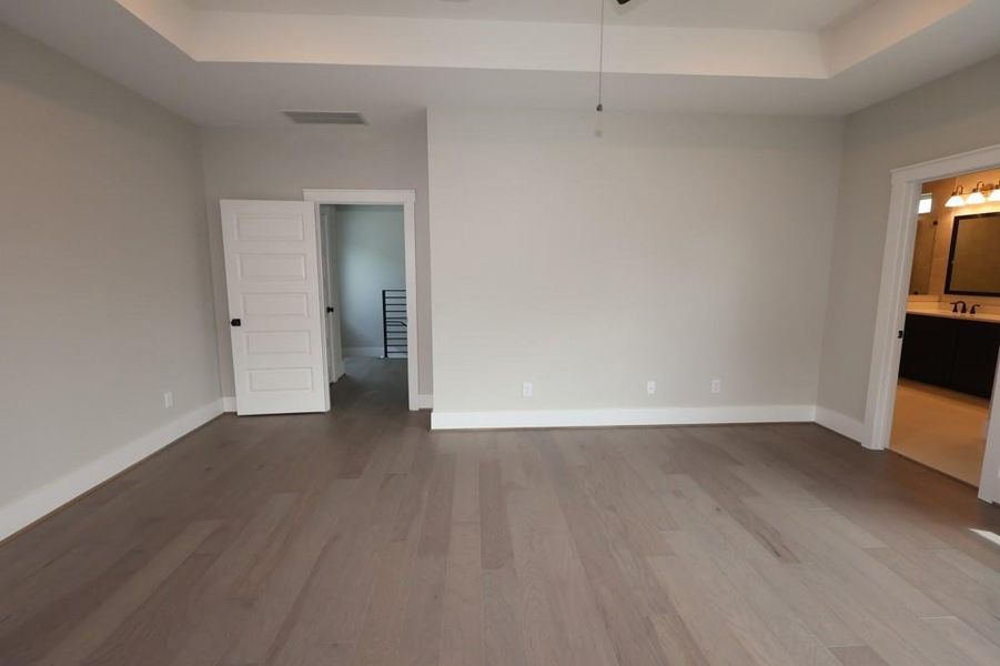 Spacious, unfurnished interior of a new home in Easthaven at Bridgeland Central - Vision Collection, Cypress (Image 7).