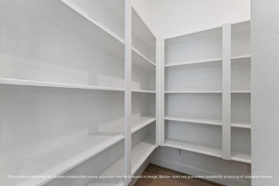 A pantry designed for ultimate organization—store all your essentials with ease in this generously sized space.