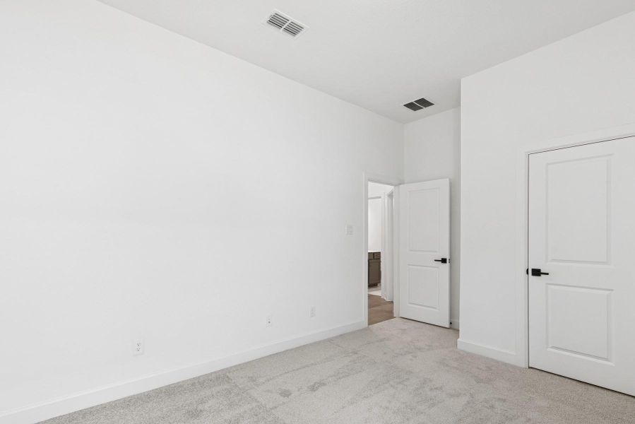 Spacious, unfurnished interior of a new home in Meridiana 55' Homesites, Manvel (Image 17).