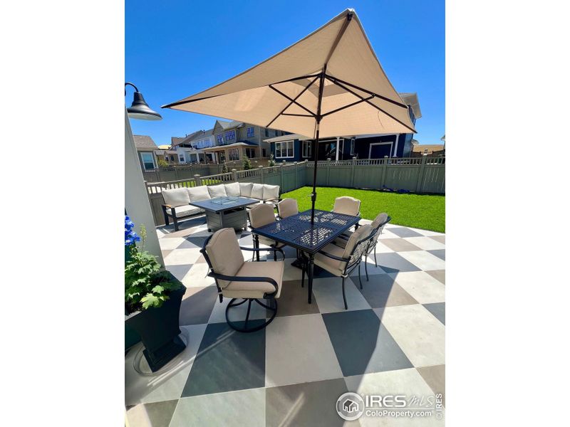 Expansive Porcelain custom patio with integrated step lights Expansive Porcelain custom patio with integrated step lights