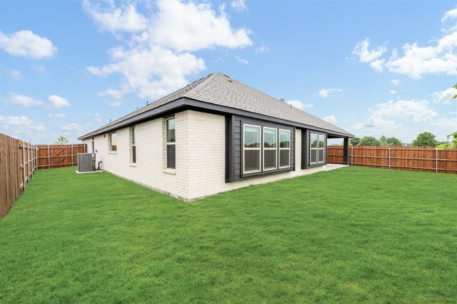 Front exterior of a new home in The Retreat at North Grove 60, Waxahachie, TX, highlighting curb appeal (Image 28). Front exterior of a new home in The Retreat at North Grove 60, Waxahachie, TX, highlighting curb appeal (Image 28).
