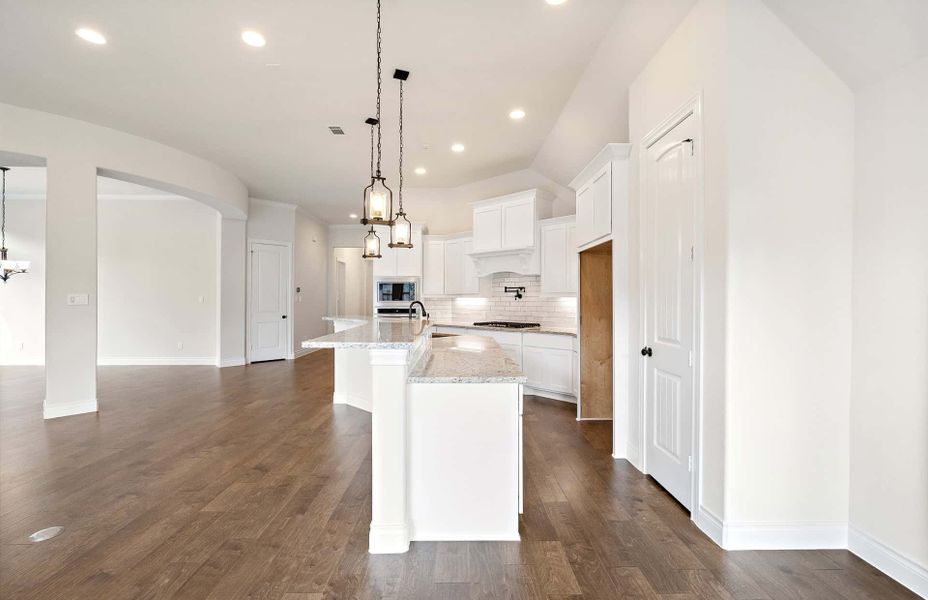 Representative furnished interior of a home built from the 2500 by Ravenna Homes in The Highlands 55′, Porter (Image 8). Representative furnished interior of a home built from the 2500 by Ravenna Homes in The Highlands 55′, Porter (Image 8).