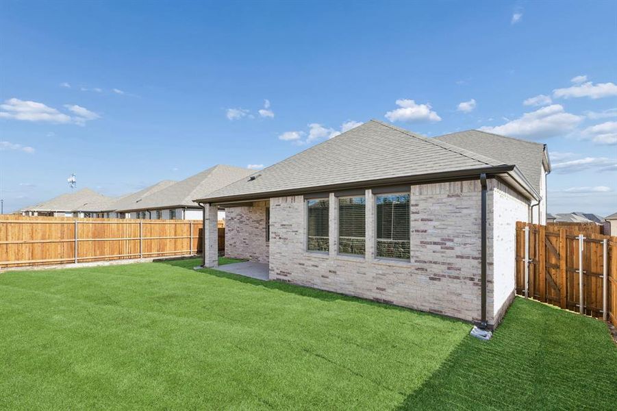 Patio in the Holden home plan by Trophy Signature Homes – REPRESENTATIVE PHOTO Patio in the Holden home plan by Trophy Signature Homes – REPRESENTATIVE PHOTO