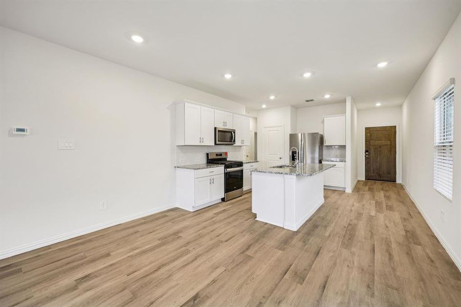 Furnished interior view inside a new home in Parks at Foster Crossing - Spring Series, Anna (Image 12).