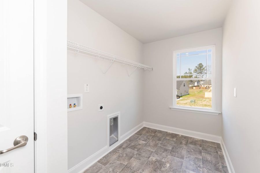 Spacious, unfurnished interior of a new home in Falls of the Cape, Lillington (Image 20).