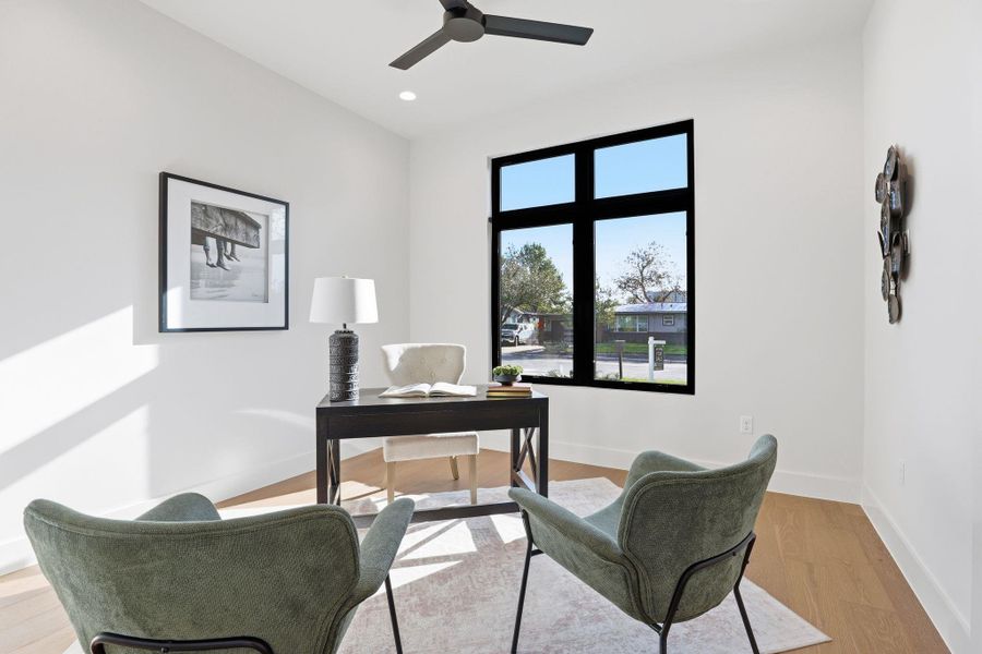 Office space with light wood-type flooring, a ceiling fan, and recessed lighting Office space with light wood-type flooring, a ceiling fan, and recessed lighting