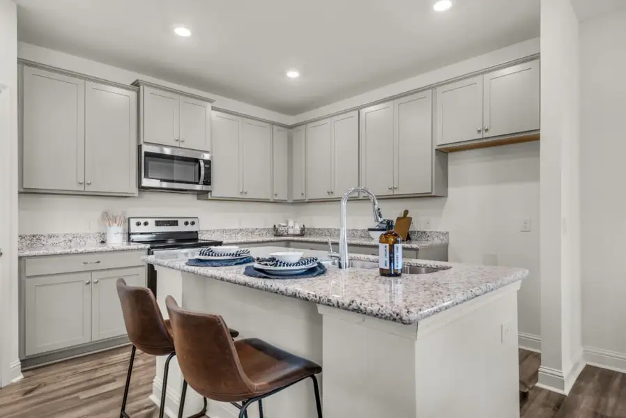 Representative furnished interior of a home built from the Cypress by Holiday Builders in Mahogany At Jubilee, Milton (Image 5).