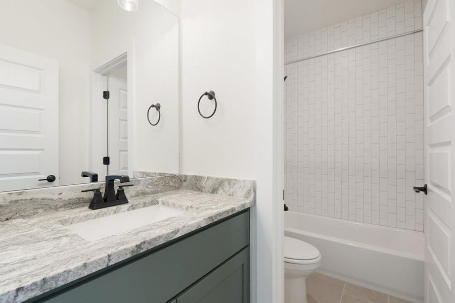 Furnished interior view inside a new home in Heritage, Dripping Springs (Image 14).
