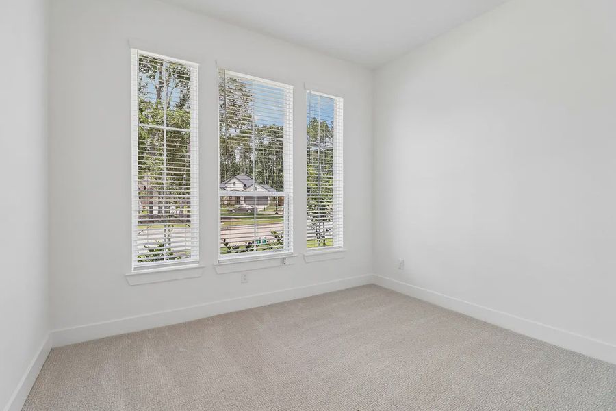 Spacious, unfurnished interior of a new home in Parkside on the River, Georgetown (Image 23).