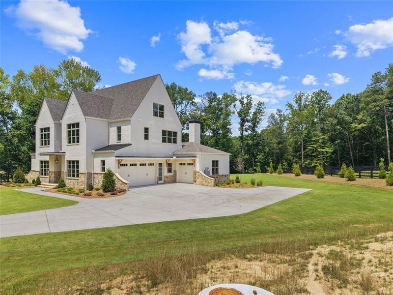 Front exterior of a new home in , Alpharetta, GA, highlighting curb appeal (Image 1). Front exterior of a new home in , Alpharetta, GA, highlighting curb appeal (Image 1).