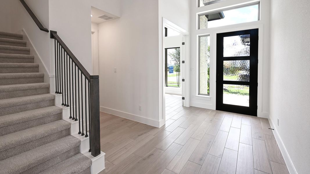 Spacious, unfurnished interior of a new home in Crosswinds, Kyle (Image 21).