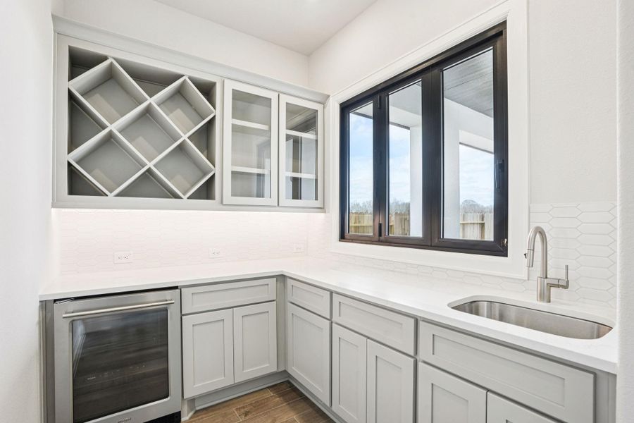 Furnished interior view inside a new home in Del Bello Lakes 60', Manvel (Image 10).