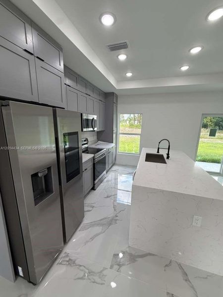Furnished interior view inside a new home in , Lehigh Acres (Image 8).