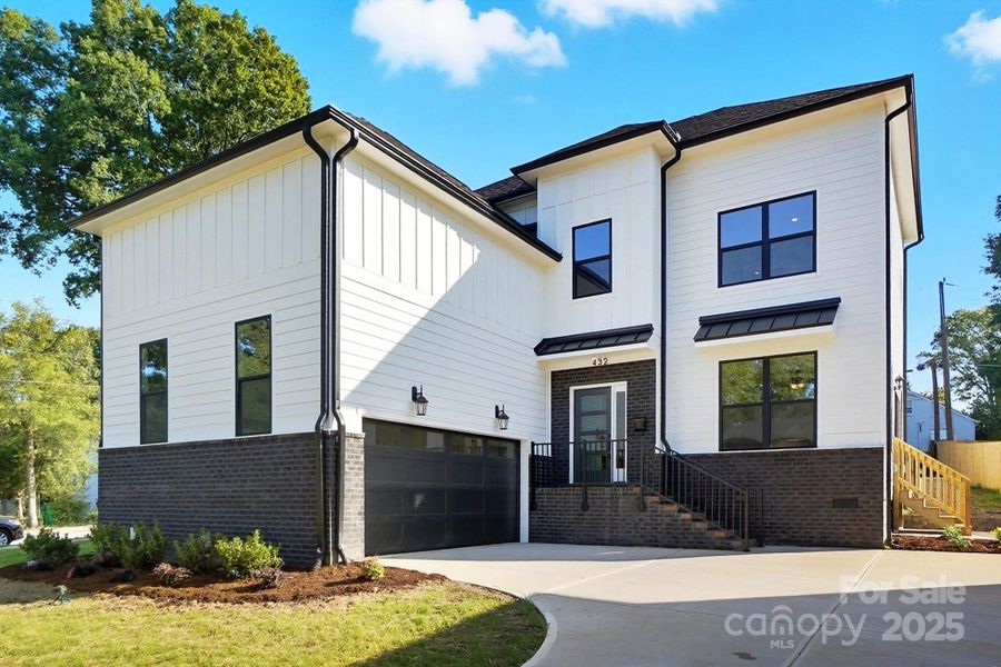 Front exterior of a new home in , Charlotte, NC, highlighting curb appeal (Image 24).