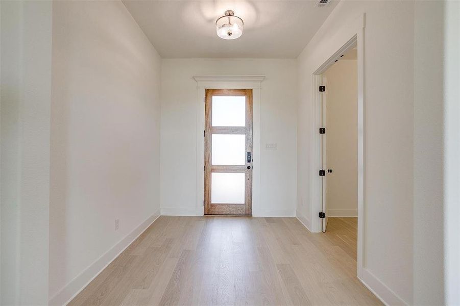 Entryway featuring light hardwood / wood-style flooring