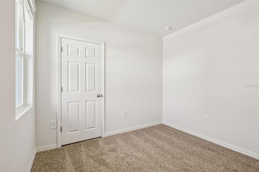 Spacious, unfurnished interior of a new home in Lake Deer Estates - Classic Series, Poinciana (Image 31).