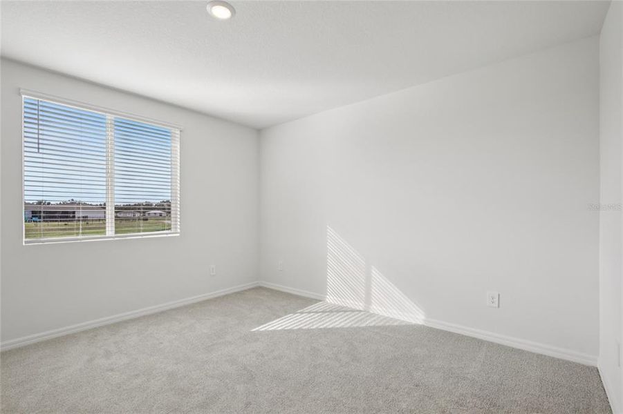 Spacious, unfurnished interior of a new home in Salt Meadows - Premier Series, Parrish (Image 14).