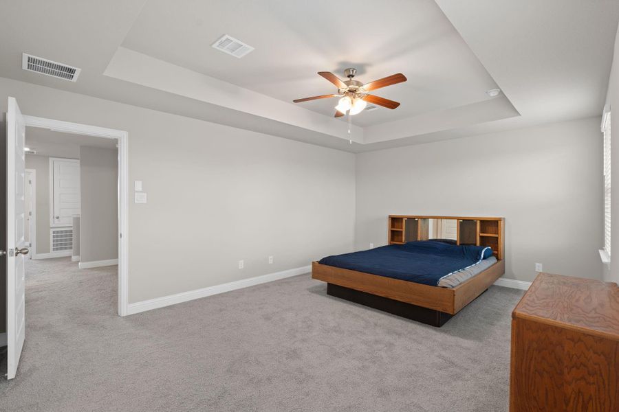 Furnished interior view inside a new home in Sunterra, Katy (Image 14).