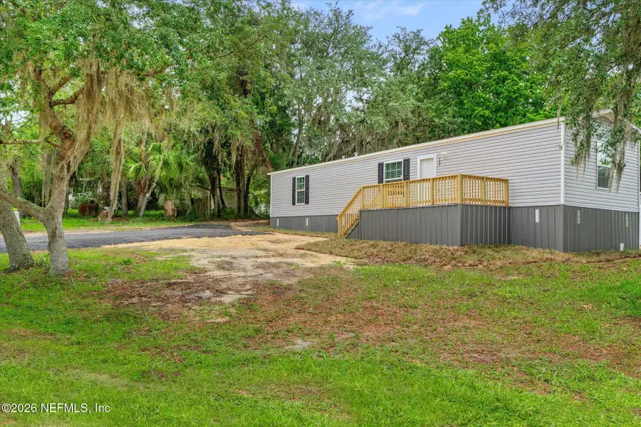 Exterior details and patio area of a home in , Satsuma (Image 1). Exterior details and patio area of a home in , Satsuma (Image 1).