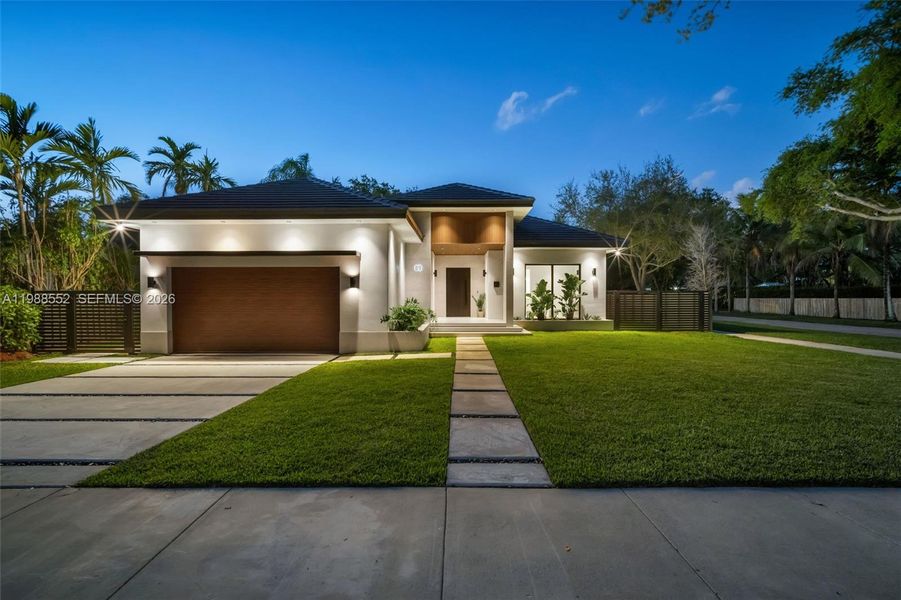 Front exterior of a new home in , Miami Shores, FL, highlighting curb appeal (Image 24).